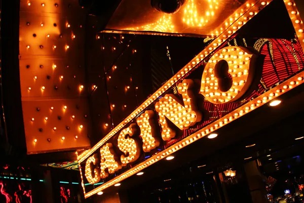 Live blackjack dealer in cheater studio with multi-camera HD feed